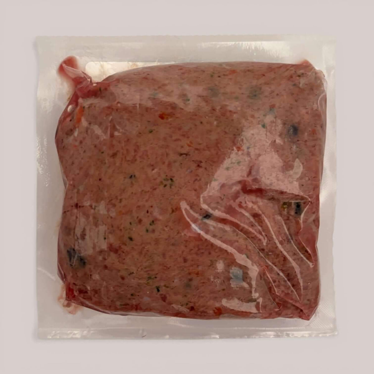 Turkey raw dog food packaged in plastic, made with premium turkey and real ingredients for canine health.