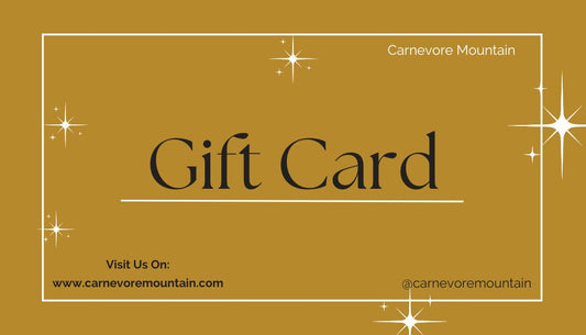 Image of the Carnevore Mountain gift card which includes the company name in the top right corner, the words Gift Card in the center of the image, Visit Us and website url of www.carnevoremountain.com in the bottom left and Carnevore Mountain Instagram handle in the bottom right which says @carnevoremountain