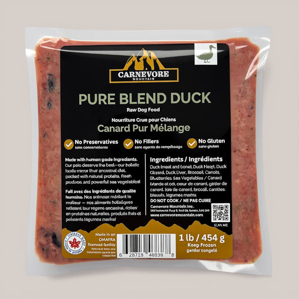 Packaged raw duck dog food with Carnevore branding on a beige background