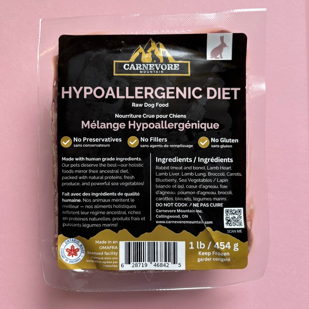 Carnevere Mountain raw dog food package on a pink background