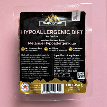 Carnevere Mountain raw dog food package on a pink background