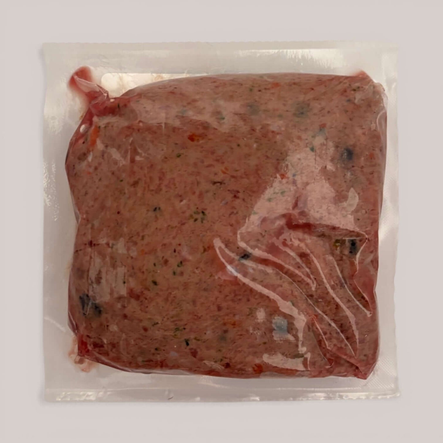 Turkey raw dog food packaged in plastic, made with premium turkey and real ingredients for canine health.